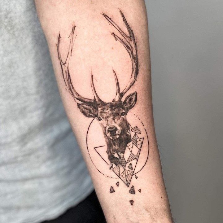 Tattoo of a deer on the forearm for men