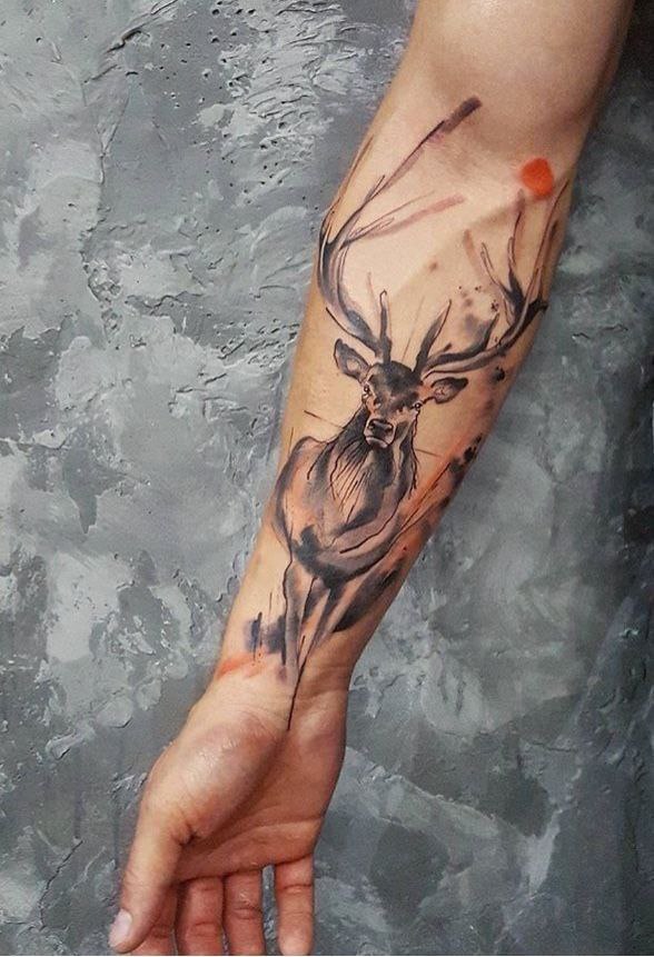 Color tattoo of a deer on the forearm for men