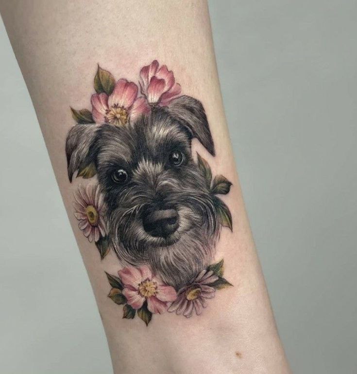 Tattoo of a dog on the shoulder for women