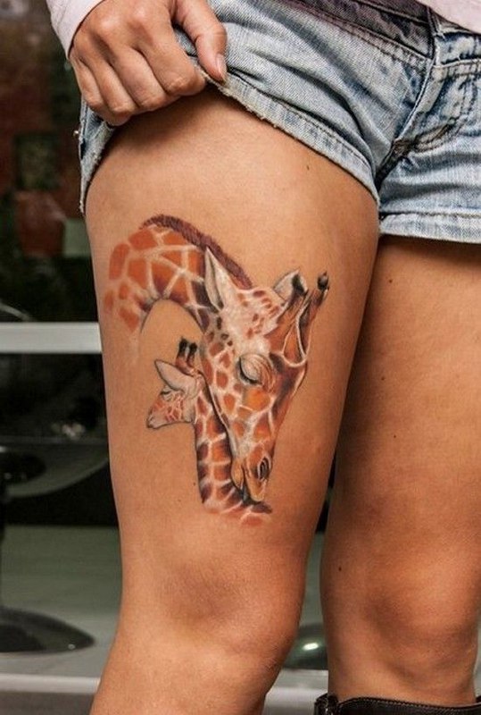 Color giraffe tattoo on the hip for women