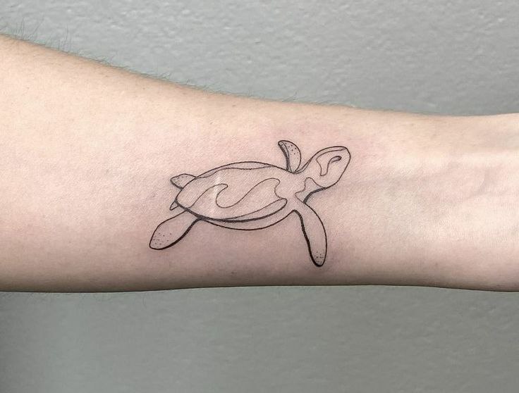 Turtle tattoo on the forearm for men