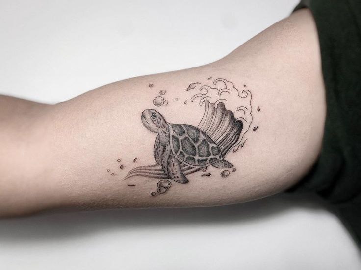 Turtle tattoo on the shin for men