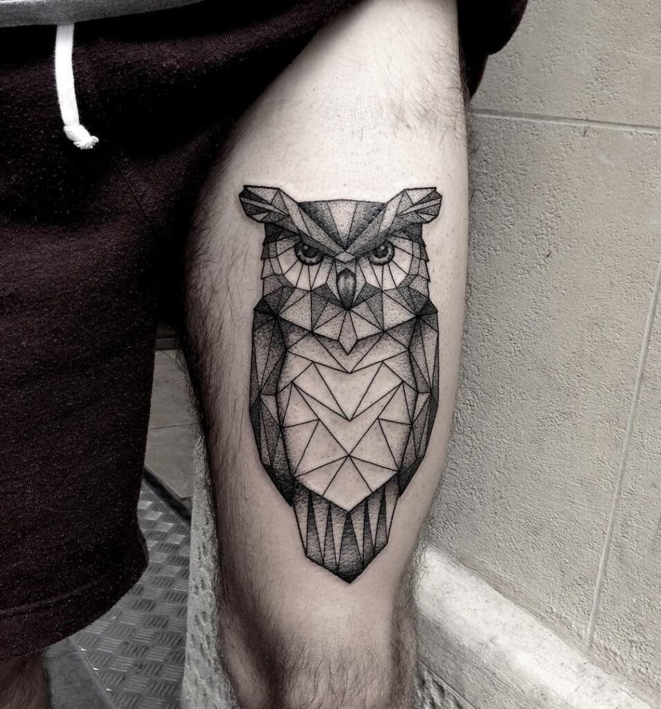 Large owl tattoo on the hip for men