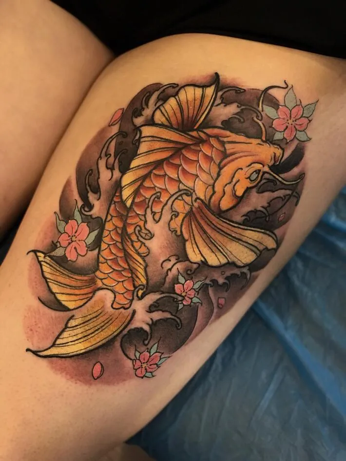 Large carp tattoo on the thigh for women