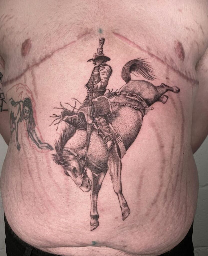 Large horse tattoo on the stomach for men