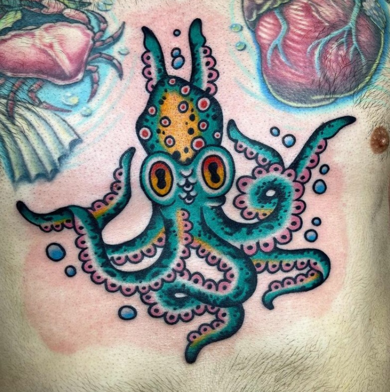 Colored octopus tattoo on the stomach for men