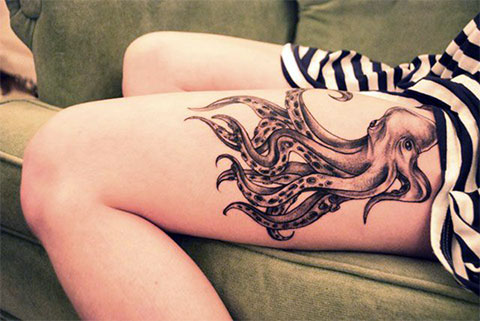 Large octopus tattoo on the thigh for women