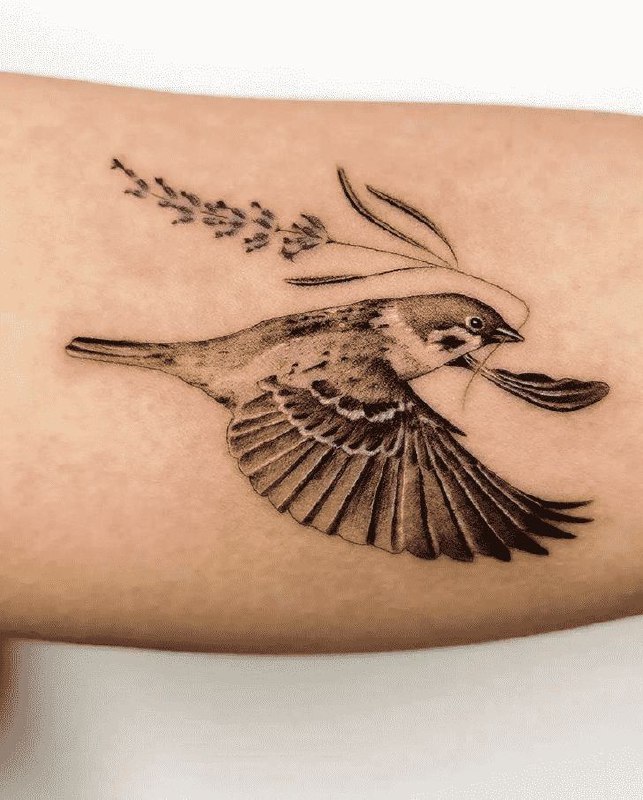 Large sparrow tattoo on the shoulder for women