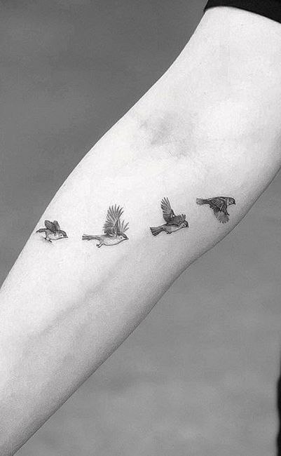 Four sparrows tattoo on the forearm for men