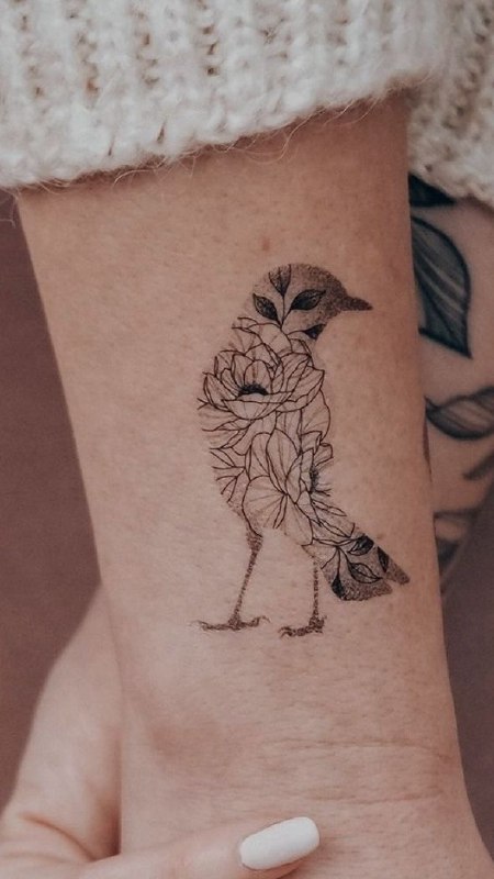 Sparrow tattoo on the shoulder for women