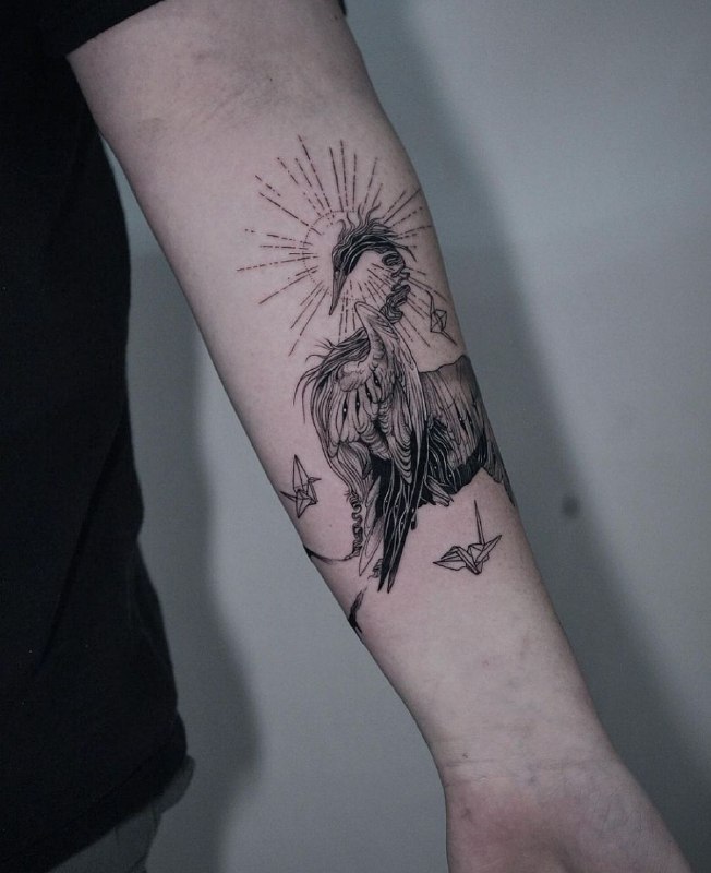 Crane tattoo on forearm for men