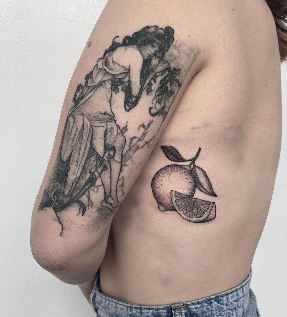 Large lemon tattoo on the side for women