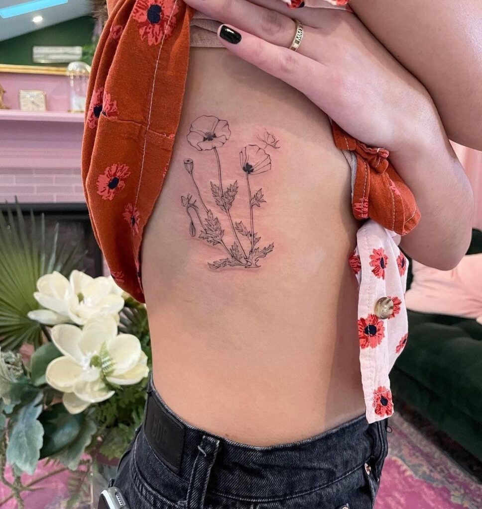 Tattoo of poppies on the side for women