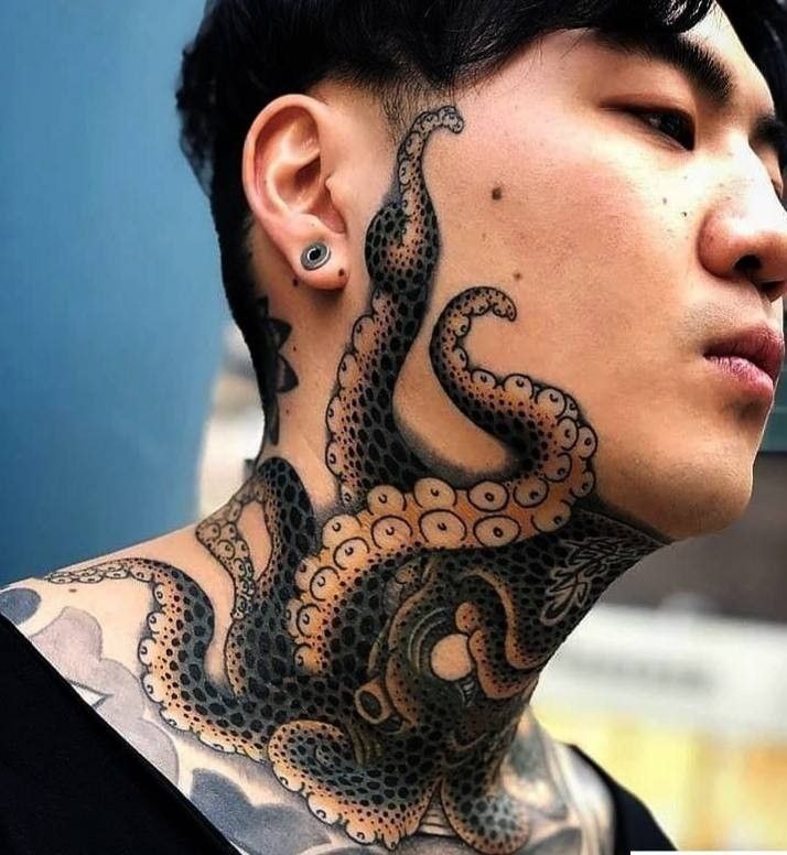 Large octopus tattoo on the neck for men