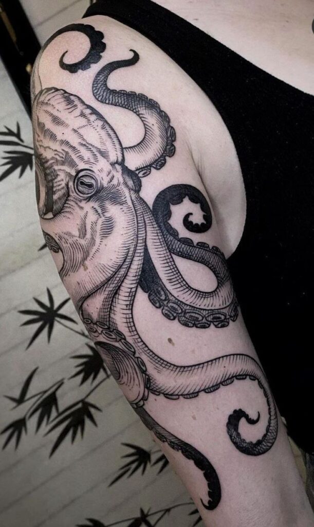 Large octopus tattoo on the arm for men