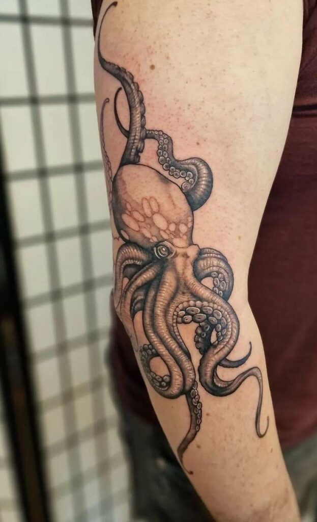 Tattoo of an octopus on the forearm for men