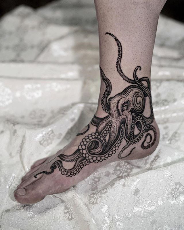 Large octopus ankle tattoo for men