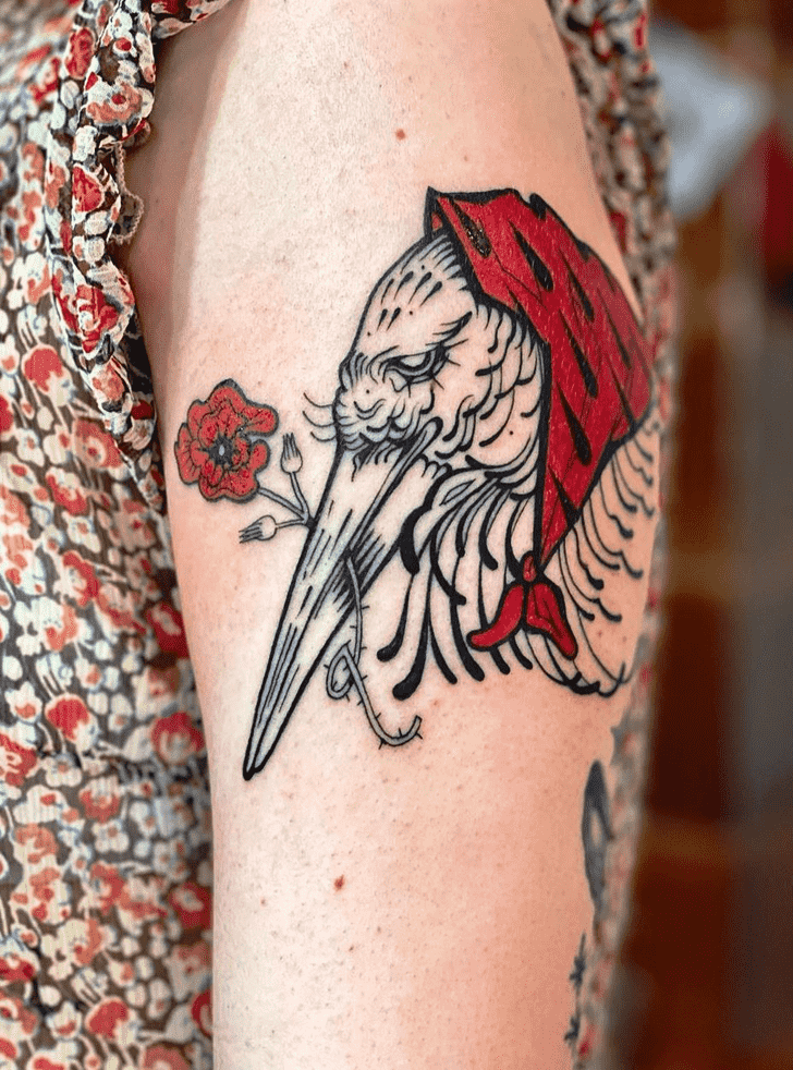 Colorful stork head tattoo on the shoulder for women