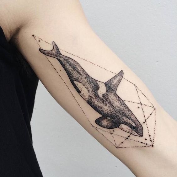 Large orca tattoo on the shoulder for men