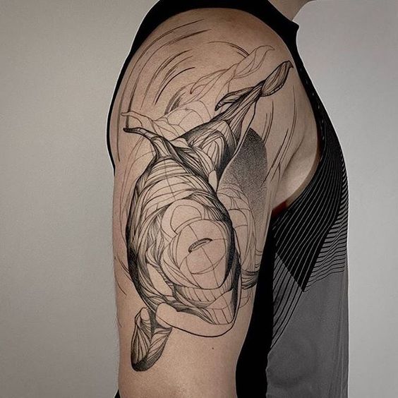 Large orca tattoo on the shoulder for men