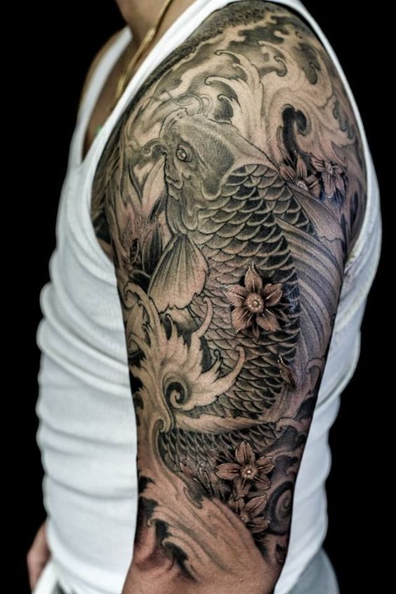 Large carp tattoo on the shoulder for men