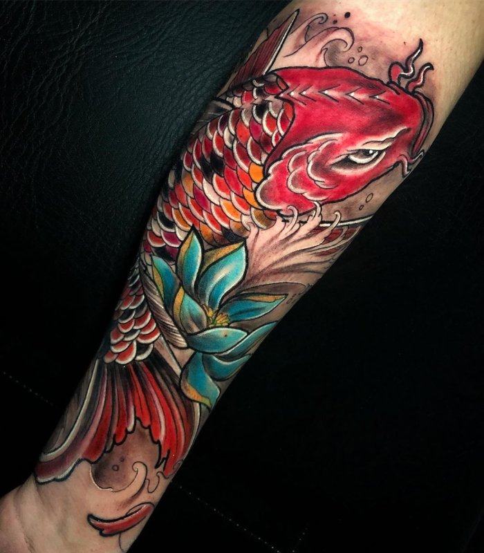 Color carp tattoo on forearm for men