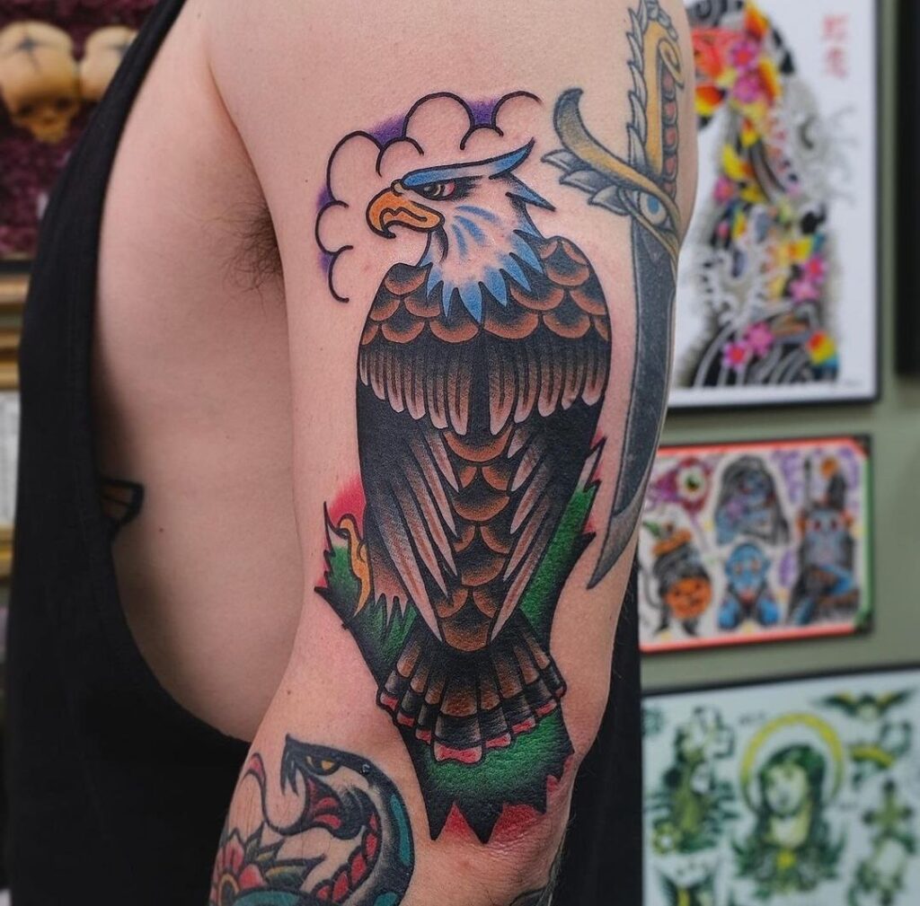 Color tattoo of an eagle on the shoulder for men