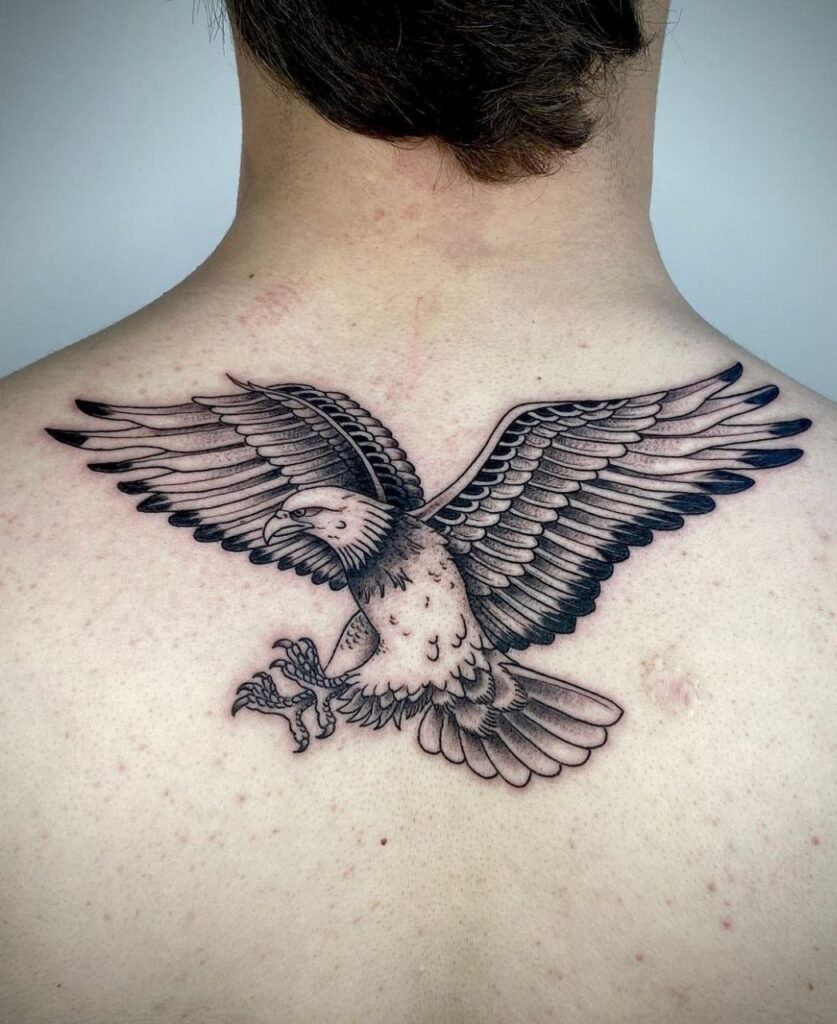 Large eagle tattoo on the back for men