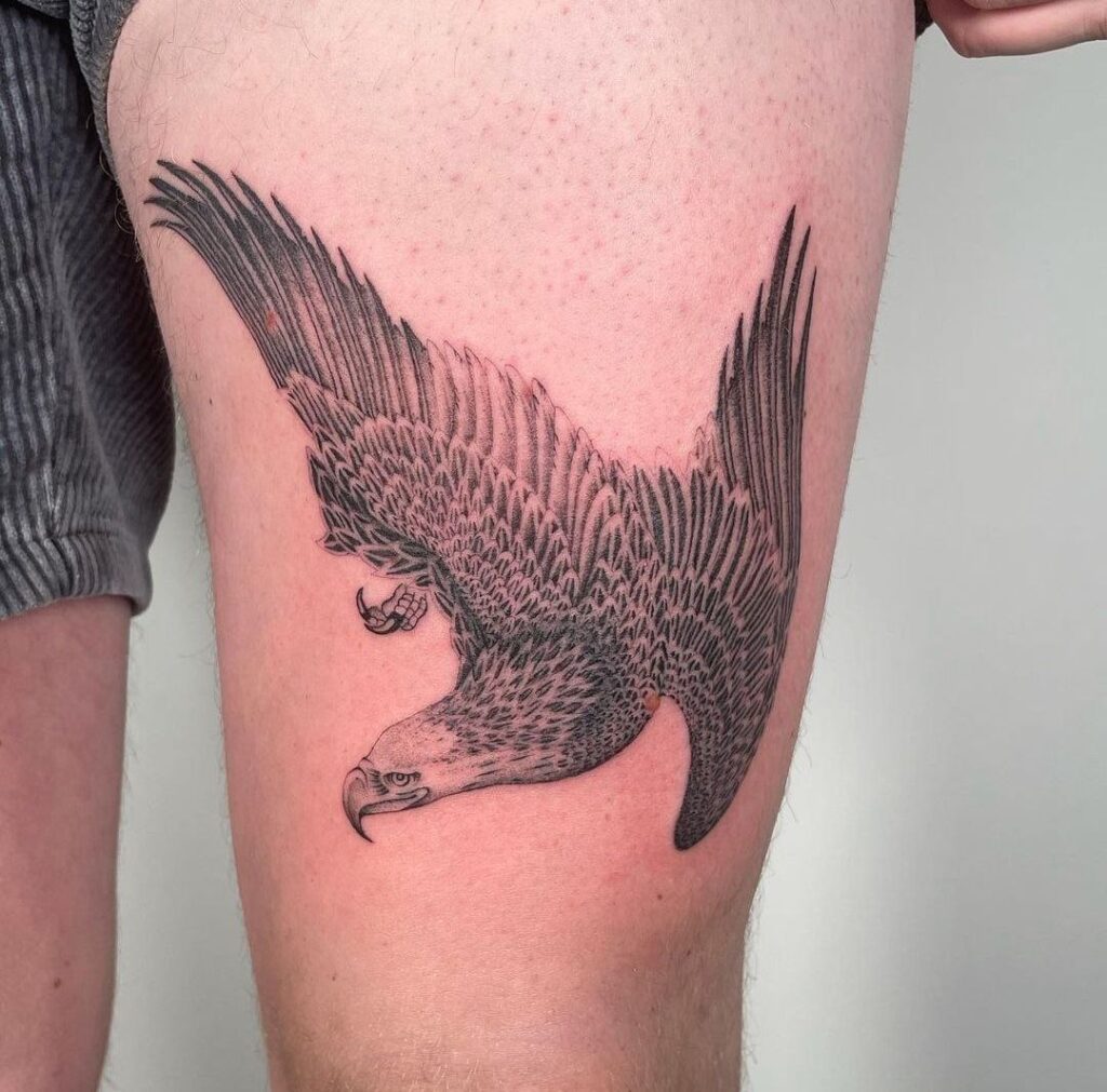 Large eagle tattoo on the thigh for men