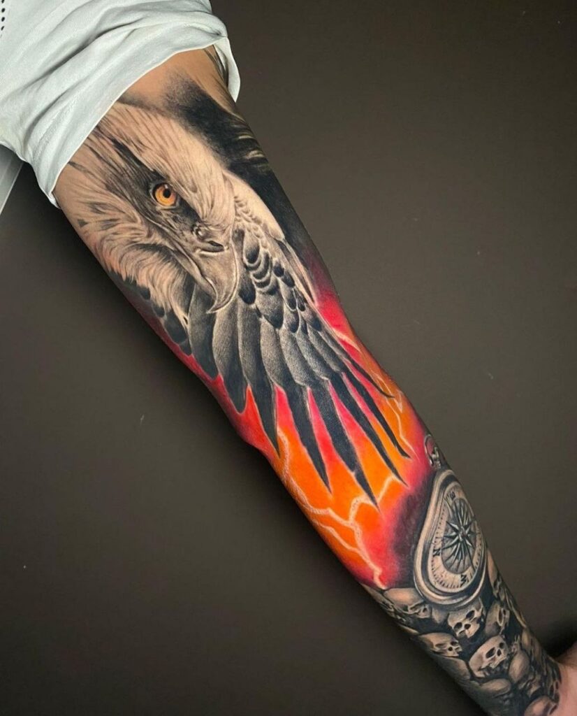 Color tattoo of an eagle on the arm for men