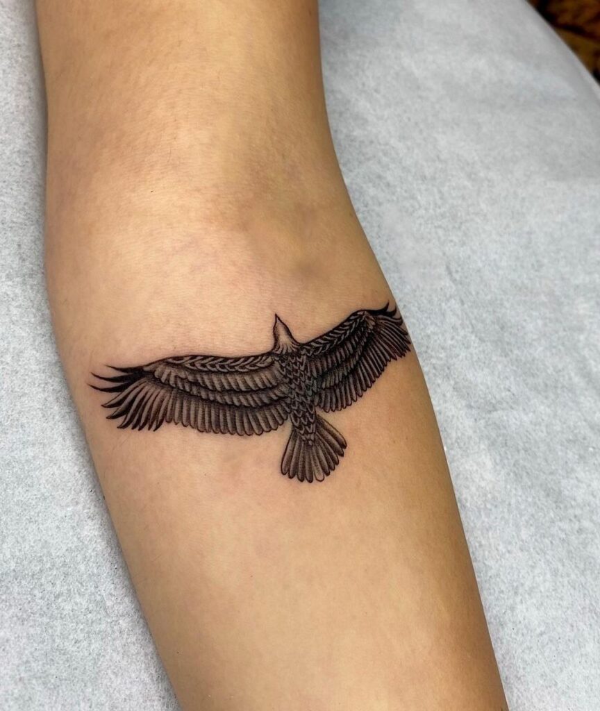 Tattoo of an eagle on the forearm for women