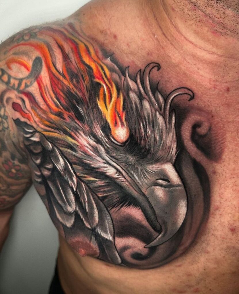 Color tattoo of an eagle with a concave on the chest for men