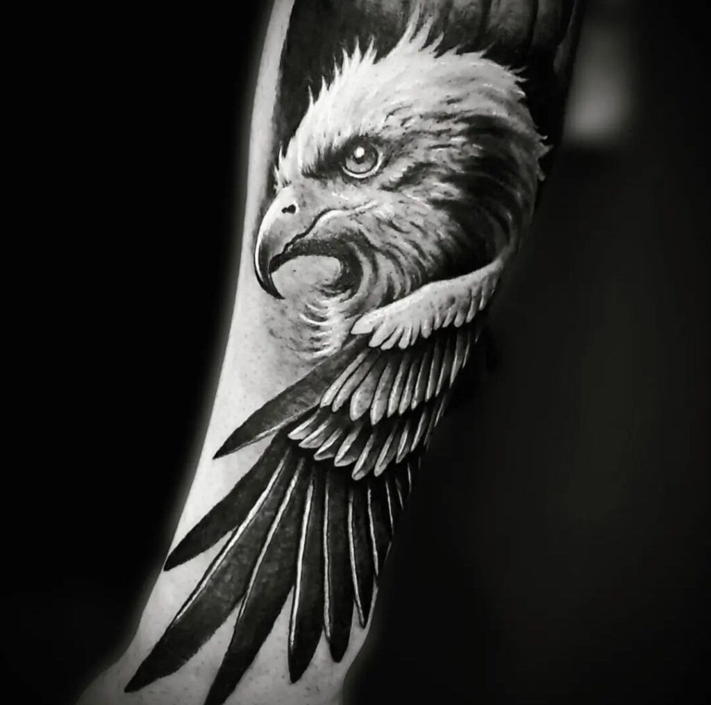 Large eagle tattoo on the arm for men