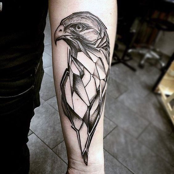 Large tattoo of an eagle on the forearm for men