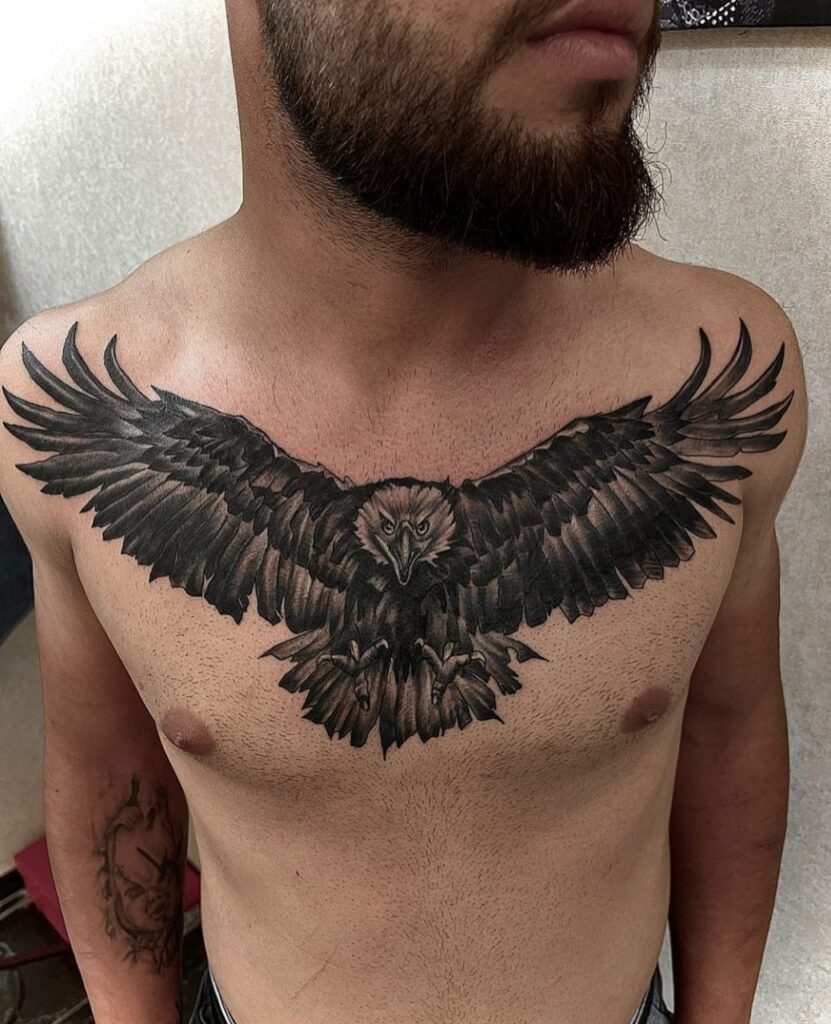 Large eagle tattoo on the chest for men