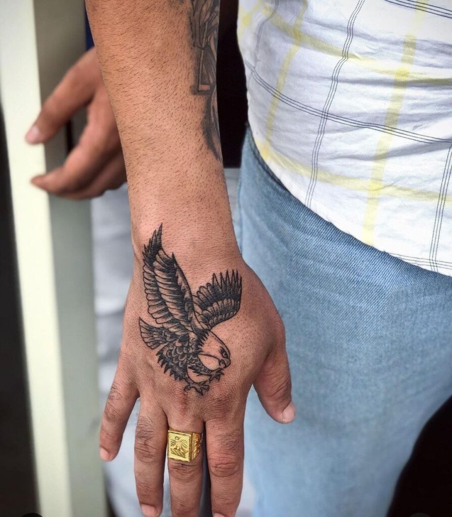 Tattoo of an eagle on the hand for men