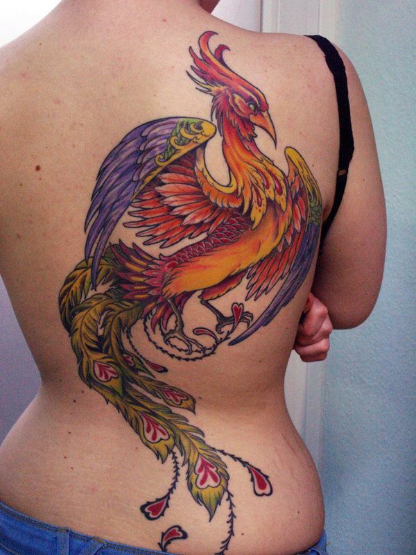 Colorful firebird tattoo on the back for women