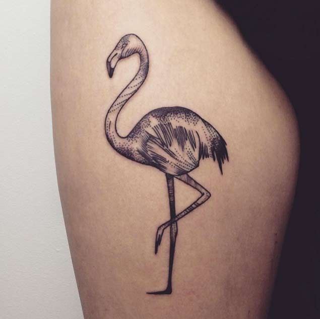 Large flamingo tattoo on the hip for women