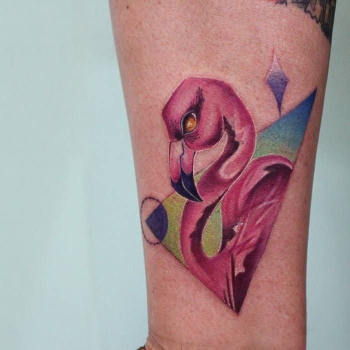 Color flamingo tattoo on the arm for women