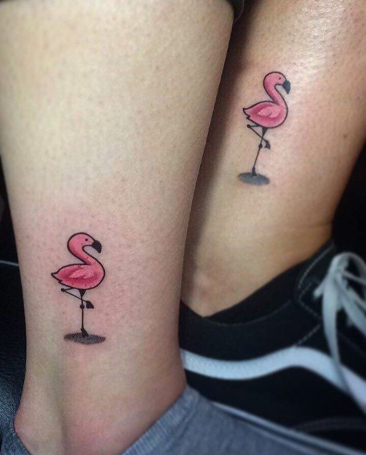 Small flamingo tattoo on legs