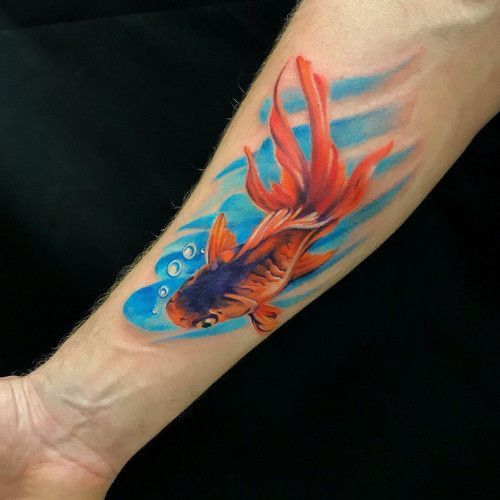 Large goldfish tattoo on the forearm for men