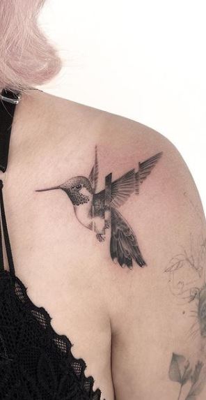 Large hummingbird tattoo on the shoulder for women