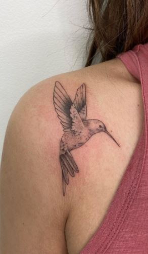 Hummingbird tattoo on the shoulder for women