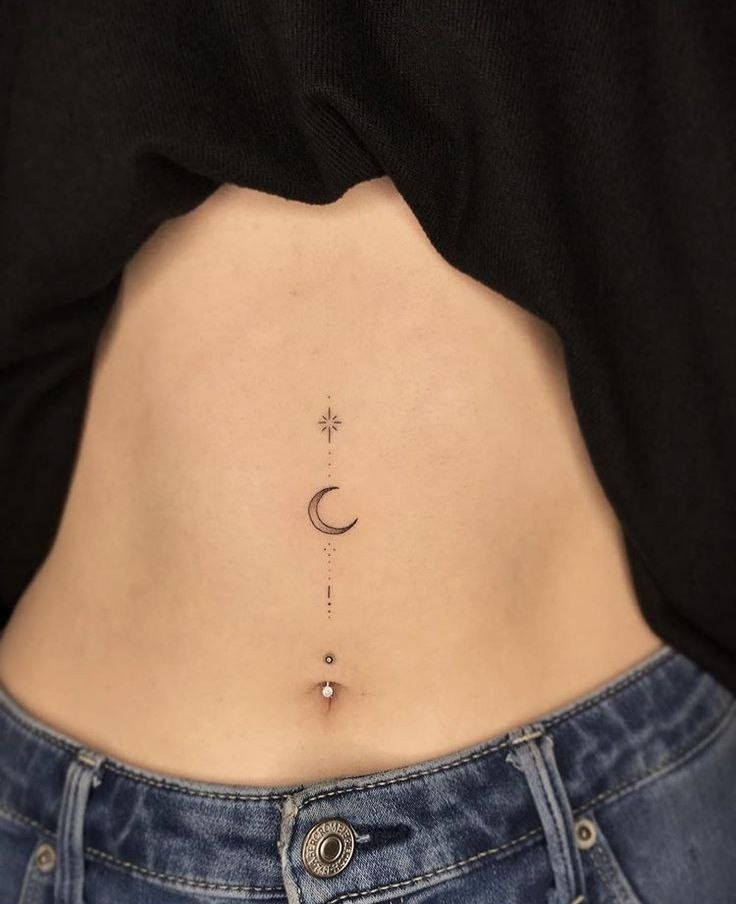 Tattoo of the moon on the stomach for women