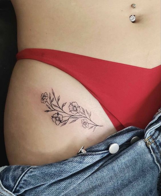 Intimate flower tattoo for women