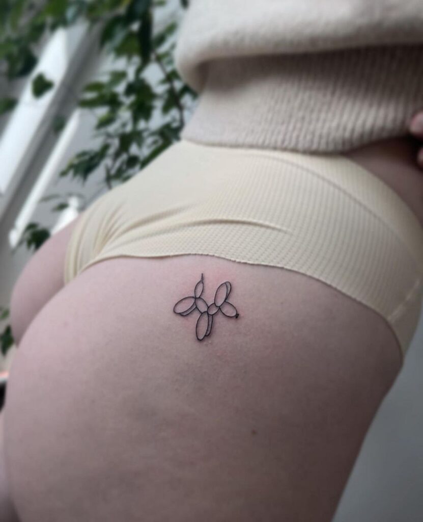 Intimate dog tattoo for women