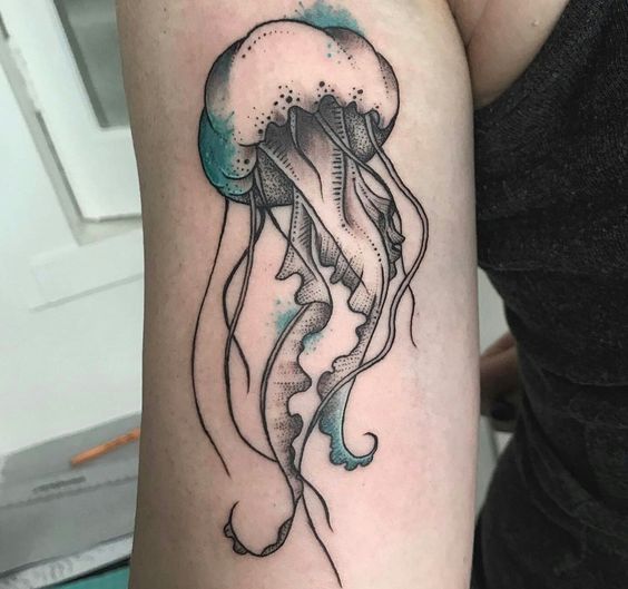 Large jellyfish tattoo on the shoulder for women