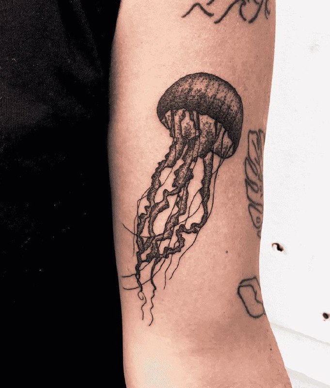 Large jellyfish tattoo on the shoulder for women