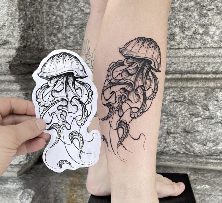 Large jellyfish tattoo on the shin for women