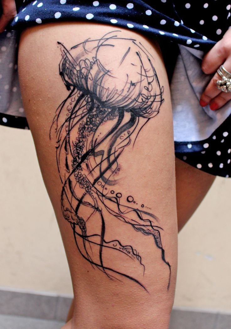 Large jellyfish tattoo on the thigh for women